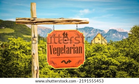 Street Sign the Direction Way to Vegetarian