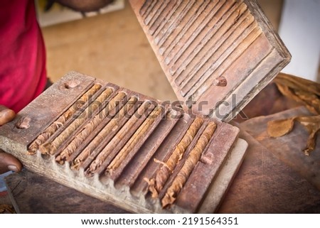 Local small manufacture or handmade production process of cigars Royalty-Free Stock Photo #2191564351