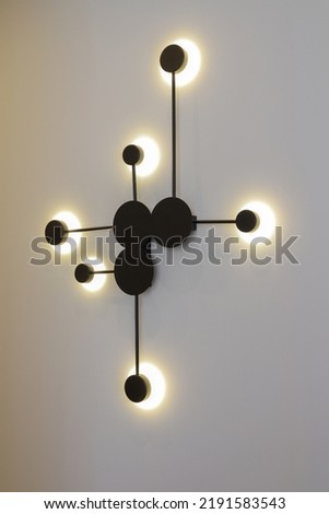 Modern black light lamp on the wall Royalty-Free Stock Photo #2191583543