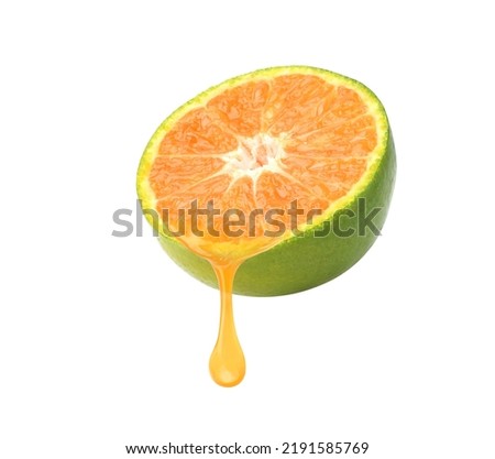 Tangerine orange juice dripping isolated on white background. Clipping path. Royalty-Free Stock Photo #2191585769