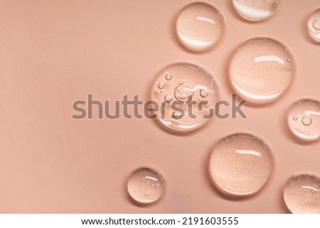 Close up Clear liquid cosmetic product. Gel texture with bubbles, skin care prodict Royalty-Free Stock Photo #2191603555