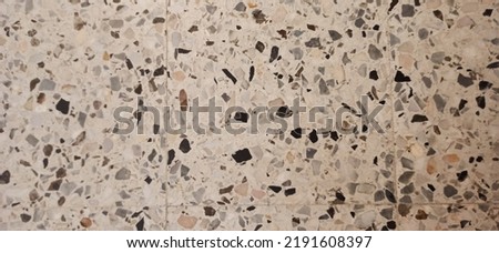 Textured background of tiles on the floor of a house