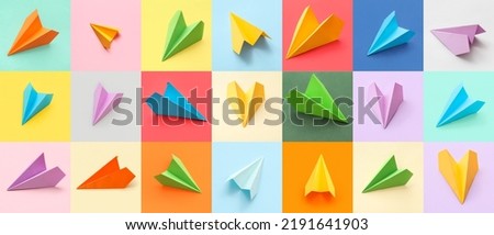 Many paper planes on colorful background Royalty-Free Stock Photo #2191641903