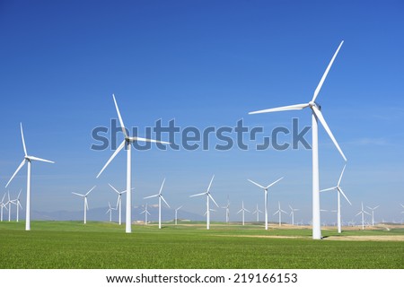 Windmills for electric power production, Zaragoza province, Aragon, Spain Royalty-Free Stock Photo #219166153