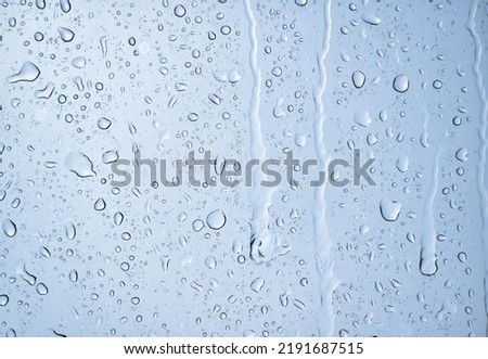 water rain Drop background and texture on glass. clean water bubbles on window nice surface Royalty-Free Stock Photo #2191687515