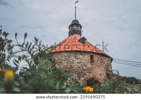 Round tower in the fortress of Korela in Russia. photo horizontal