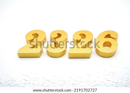   Number 2326 is made of gold painted teak, 1 cm thick, laid on a white painted aerated brick floor, visualized in 3D.                                