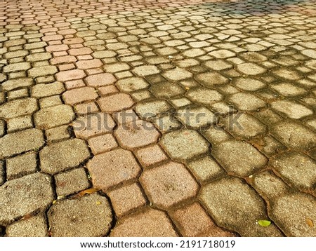 A large area using paving blocks in the form of octagonal prisms and squares