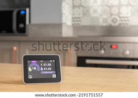 Smart energy meter. Checking domestic electricity and gas use. Smart meter reading. Royalty-Free Stock Photo #2191751557