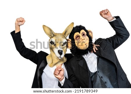 Monkey man and kangaroo woman making success and winner gesture. Isolated white background