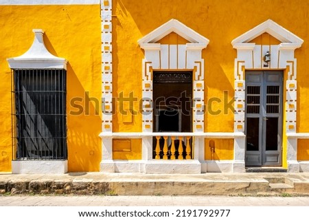 Typical old yellow house at the magical town of Izamal in Yucatan, Mexico Royalty-Free Stock Photo #2191792977