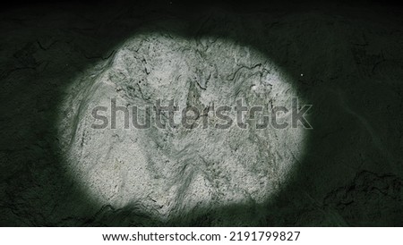 Discovering a trench in the sea bed with a spot light. Submarine view of the bottom of the ocean underwater (Ocean floor) Royalty-Free Stock Photo #2191799827