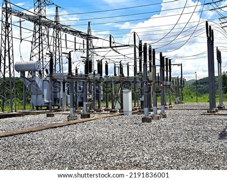 Stations and high voltage poles 115 kv at Nam Theun 1 Royalty-Free Stock Photo #2191836001