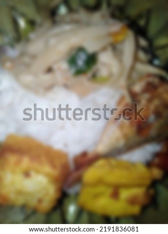 stir-fry mushrooms, fried tofu and salted fish, white rice blur photo 