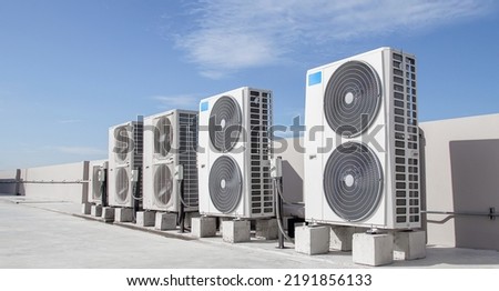 Air conditioning (HVAC) installed on the roof of industrial buildings. Royalty-Free Stock Photo #2191856133