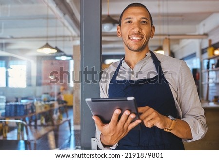 Restaurant entrepreneur with tablet, leaning on door and open to customers portrait. Owner, manager or employee of a startup fast food store, cafe or coffee shop business standing happy with a smile Royalty-Free Stock Photo #2191879801