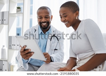 Doctor, healthcare and medicine with a patient talking test results and progress on a tablet in a hospital clinic. Trust, help and medical consulting with a professional medicare worker in his Royalty-Free Stock Photo #2191880035