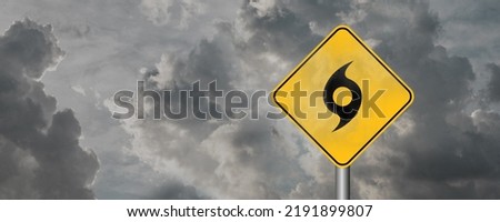 hurricane season sign on cloudy background Royalty-Free Stock Photo #2191899807