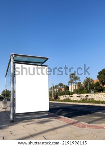 White banner on the bus stop on a street - stock photo