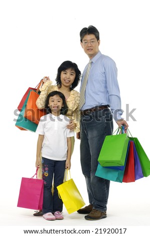 Happy family shopping. Isolated over white background