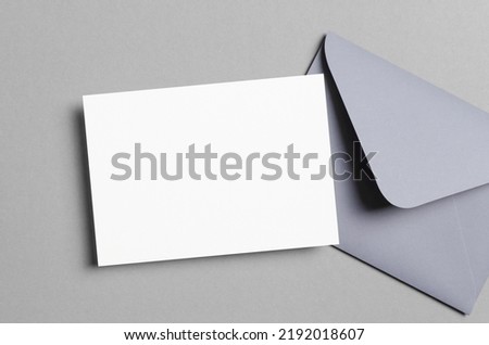 Blank invitation or greeting card mockup with envelope