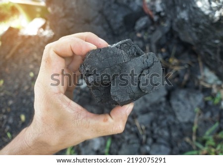 Raw Sub-Bituminous coal is a higher carbon content than lignite, used as a power source for electricity generation and industry. Royalty-Free Stock Photo #2192075291