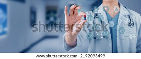 Medicine doctor hand and showing medical pill with digital medical interface icons, Medical technology and network concept.
