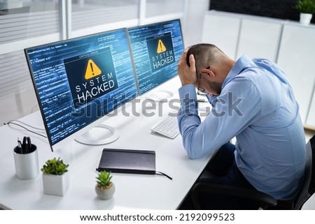 Ransomware Malware Attack. Business Computer Hacked. Security Breach Royalty-Free Stock Photo #2192099523