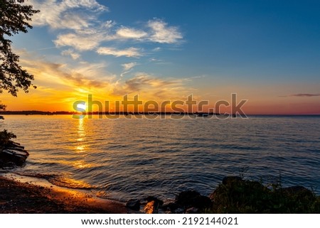 Sunset over Lake Simcoe. Ontario, Canada Royalty-Free Stock Photo #2192144021