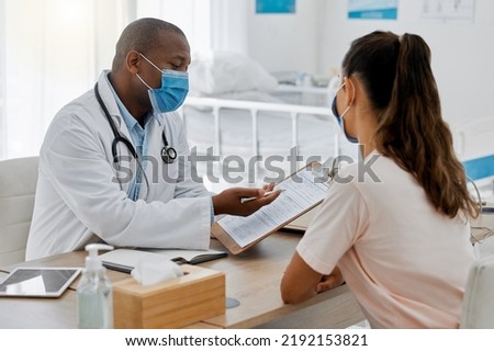 Health insurance, compliance and medical admin in covid pandemic, doctor consulting with patient in office. Healthcare professional helping a woman, discussing plan while signing permission form