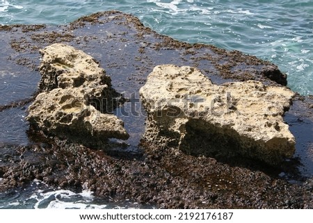 Large stones on the shore of the Mediterranean Sea