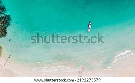 boat is floating in the sea on top view of bird's eyes view picture