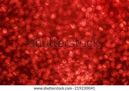 Red background with shimmering glitter - Defocused lights.