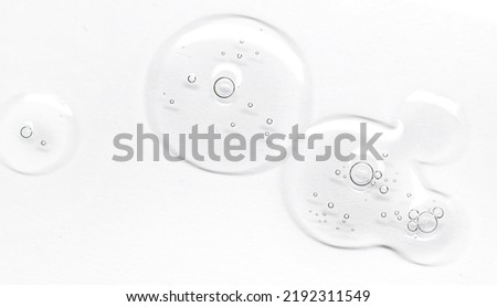 Close up Clear liquid cosmetic product. Gel texture with bubbles, skin care prodict Royalty-Free Stock Photo #2192311549