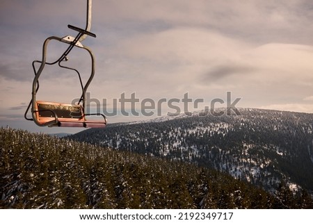 sky high - empty chair lift in Ramzova Ski  Royalty-Free Stock Photo #2192349717