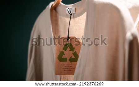 Recycling Products Concept. Organic Cotton Recycling Cloth. Zero Waste Materials. Environment Care, Reuse, Renewable for Sustainable Lifestyle. Recycle Icon show on Tag