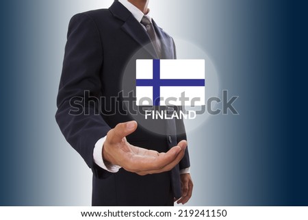 Businessman hand showing Finland Flag 