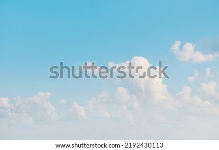 Sky Background for Design. White soft clouds on light blue Sky. Beautiful  Natural cloudscape texture. Scenic Wallpaper or Web banner With Copy Space 