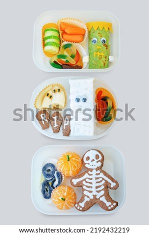 Kid's lunch box in the form of monsters for Halloween. toning. selective focus