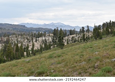 Part of the distant Yosemite National Park can be seen from this trail in the Emigrant Wilderness of Stanislaus National Forest.  Royalty-Free Stock Photo #2192464247