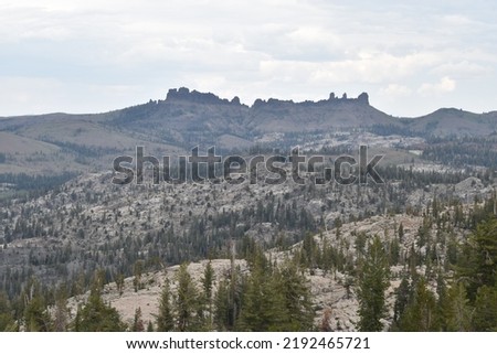 The Three Chimneys and associated mountain range as seen from a trail to Chewing Gum Lake in the Emigrant Wilderness of Stanislaus National Forest. Royalty-Free Stock Photo #2192465721