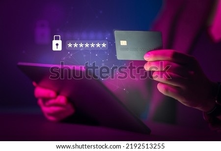 Using a password for mobile cybersecurity or a password to confirm login in the online banking application. Cyber security threats. Tablet pc and credit card.