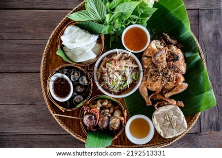 Traditional North-east Thai Local food set (Esan). Royalty-Free Stock Photo #2192513331
