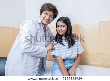 portrait of Doctor and child  in hospital  Royalty-Free Stock Photo #2192526939