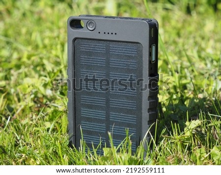 Solar power bank for outdoor activities. Green energy. Portable solar battery. Portable solar panels for camping