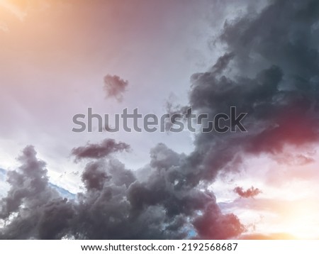Colorful cloudy sky after rain with black clouds after rain, Sky. Natural background. Evening summer cloudscape Royalty-Free Stock Photo #2192568687