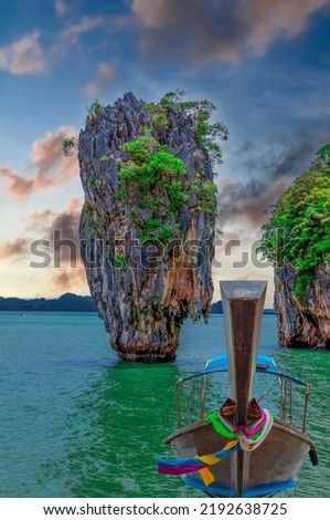 James Bond Island Phuket Thailand. Lovely rock in the middle of the ocean surrounded by mountains Royalty-Free Stock Photo #2192638725