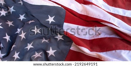 a retro worn wrinkled old American flag vintage background America national government election backdrop