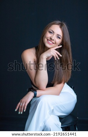 business woman on black background. Beautiful woman