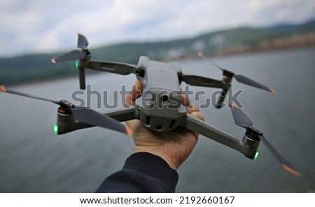 quadrocopter in the hand of the operator